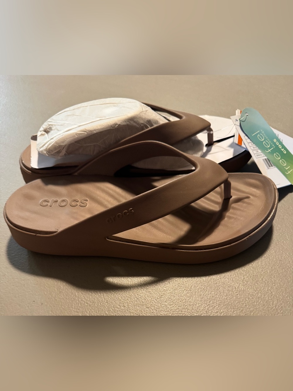 NWT CROCS Women’s Tan Flip Flops Sandals Size 8